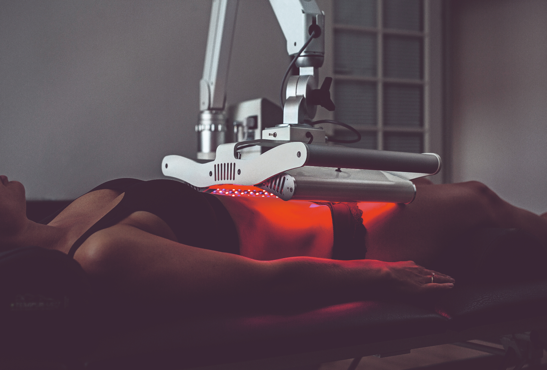 GigaLaser positioned over the lower abdomen for fertility support